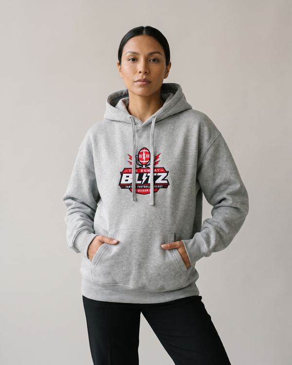 Woman in the heather grey Crest Fleece Hoodie with her hands in the pocket