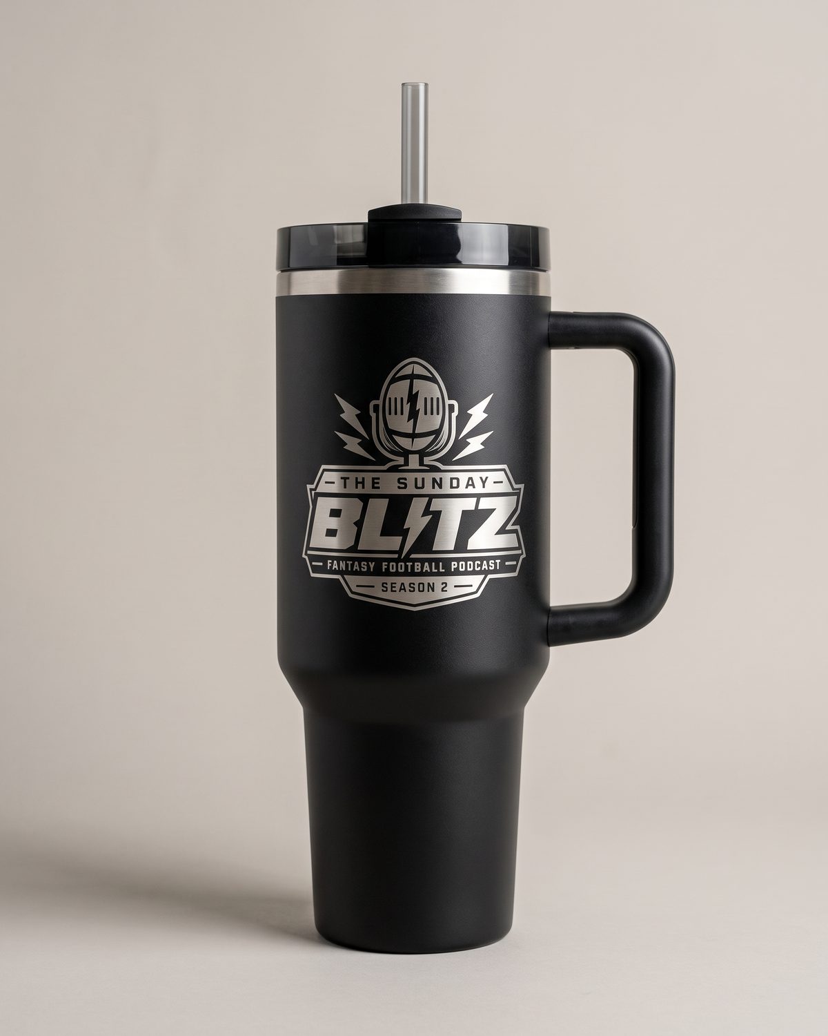 Matte black 40 oz Tailgate Tumbler with the engraved crest